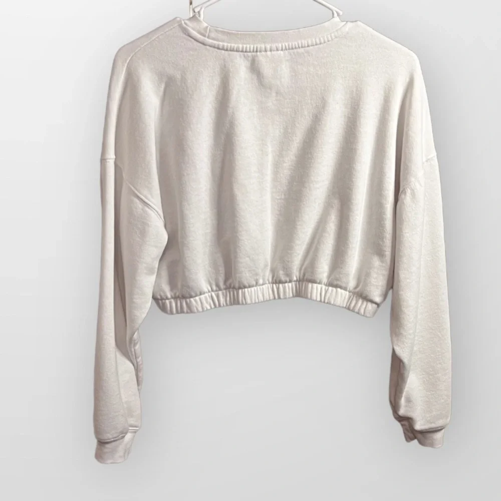 Coca Cola brand Juniors white crop sweater, size Large. Like new condition - Picture 2 of 3